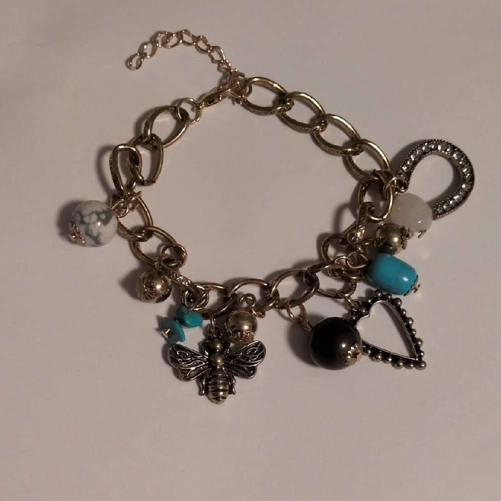 Gold Charm Bracelet with Silver Accents